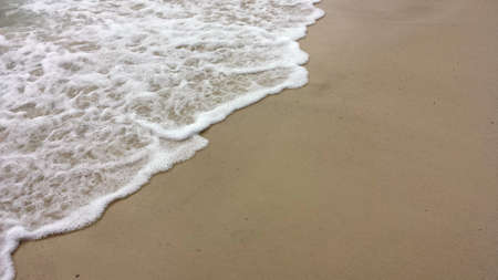 Gentel waves on beach の写真素材