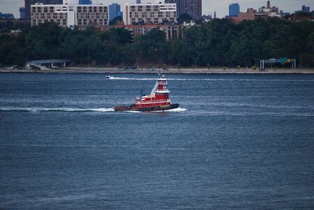 Tugboat in New York Harborの写真素材
