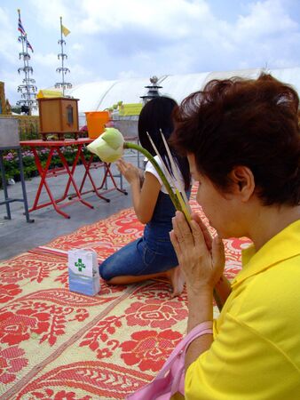 BANGKOK, THAILAND - APRIL 03: Thai people worship a Buddhist shrine at a Buddhist festival in Suan Luang. April 03 2007 in Bangkok. のeditorial素材