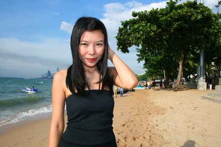 Asian girl on Pattaya beach, Thailand.の写真素材