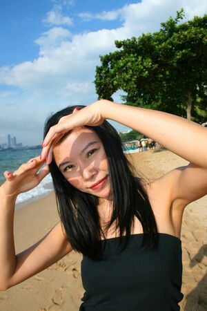 Asian girl on Pattaya beach, Thailand.の写真素材