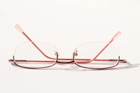 Glasses on white.
