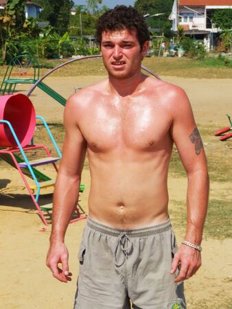 Man on a beach in Thailand の写真素材