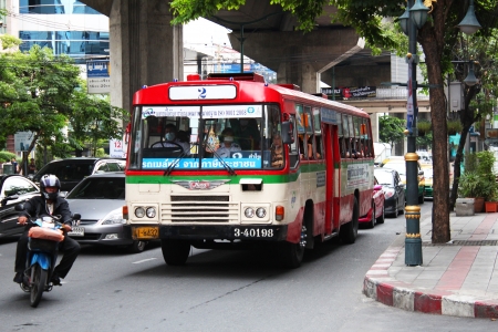 BANGKOK - JUNE 27  Public bus stopping at Asok station in Sukumvit on June 27, 2012 in Bangkok, Thailand  のeditorial素材