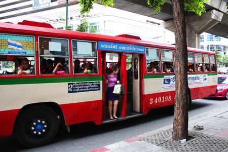 BANGKOK - JUNE 27  Public bus stopping at Asok station in Sukumvit on June 27, 2012 in Bangkok, Thailand  のeditorial素材