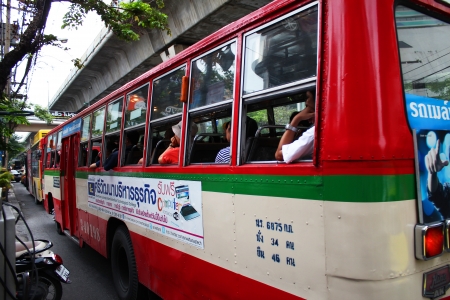 BANGKOK - JUNE 27  Public bus stopping at Asok station in Sukumvit on June 27, 2012 in Bangkok, Thailand  のeditorial素材