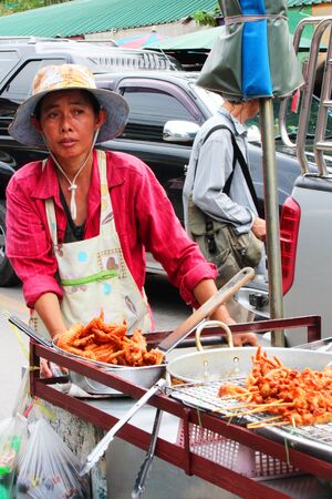 BANGKOK - AUGUST 20  Thai people selling things outside in Chatuchak market on August 20, 2012 in Bangkok, Thailand のeditorial素材