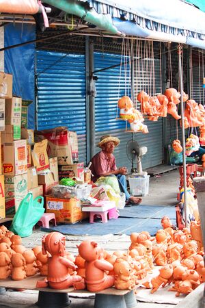 BANGKOK - AUGUST 20  Thai people selling things outside in Chatuchak market on August 20, 2012 in Bangkok, Thailand のeditorial素材