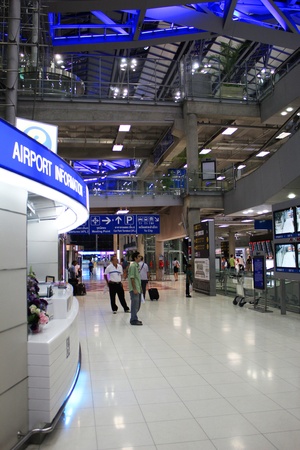BANGKOK - AUGUST 28  Suvarnabhumi ariport in the evening with passengers arriving and departing on August 28, 2012 in Bangkok, Thailand のeditorial素材