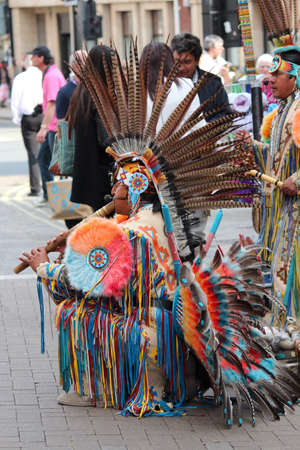 Aztec/ Maya Busker in Traditional Dress, England.のeditorial素材