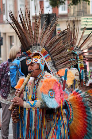 Aztec/ Maya Busker in Traditional Dress, England.のeditorial素材