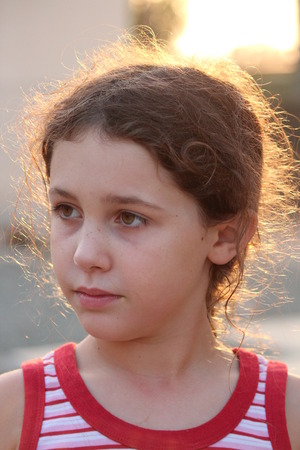 Young Girl Posing For Camera, England.の写真素材