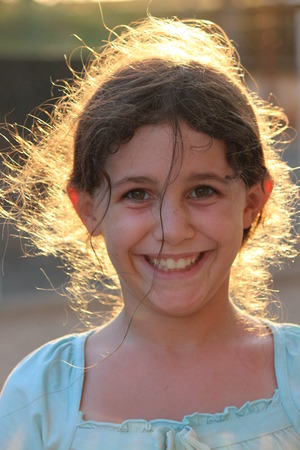 Girl Pulling Faces at Camera, England.