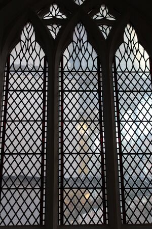 Diamond Panes of Glass in Church Window, England.の写真素材