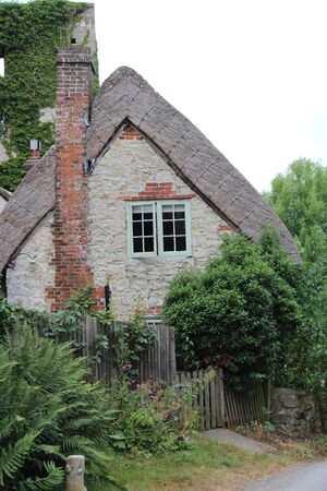 Thatched Cottage in Rural England in Summerのeditorial素材