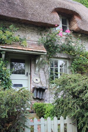 Thatched Cottage in Rural England in Summerのeditorial素材