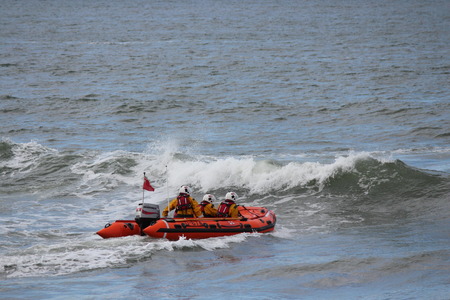 Dinghy Racing Against Waves At Whitby, Yorkshire.のeditorial素材