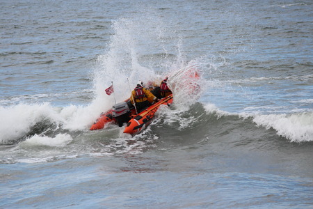 Dinghy Racing Against Waves At Whitby, Yorkshire.のeditorial素材