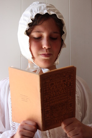 Young Girl Wearing Victorian Cotton Bonnet.
