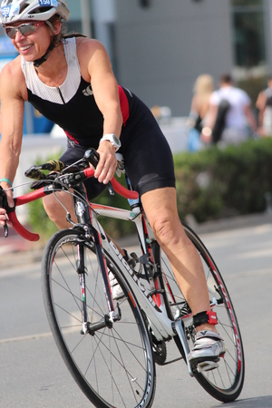 Editorial: Cyclist Completing Second Stage of Ayia Napa Triathlon, Nisi Beach, Cyprus, Sunday 3rd April 2916のeditorial素材