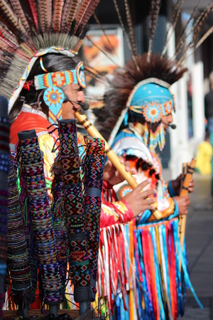 South American Indian Musicians in Traditional Costume Playing Panpipes.のeditorial素材