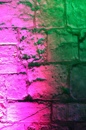 Rainbow Floodlighting on Medieval Stone Building.の写真素材