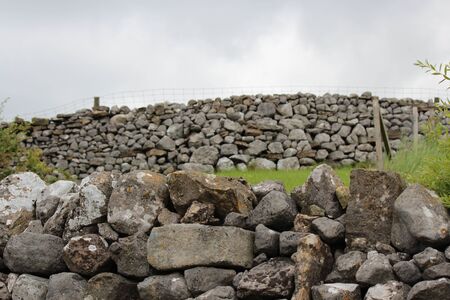 Dry Stone Wall With Sheep on Hill Top, Yorkshire.の写真素材