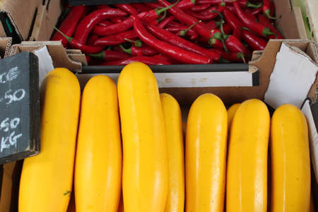 Vivid selection of fruit and vegetables on market stall.の写真素材