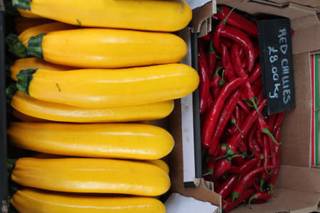 Vivid selection of fruit and vegetables on market stall.の写真素材
