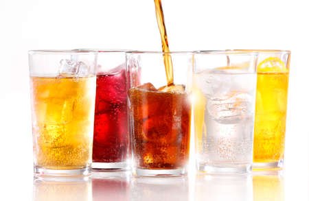 Soft drinks with ice being poured Soft drinks with ice being poured