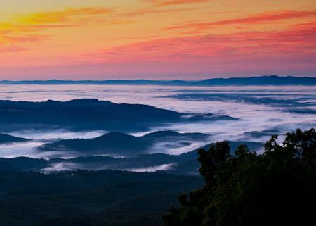 Predawn view of ocean-like clouds from atop the Blue Ridge Parkway in North Carolina.の写真素材