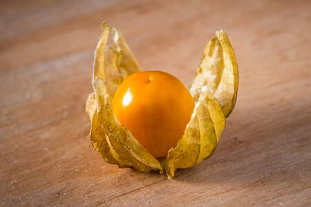 Physalis fruit on the wooden backgroundの写真素材