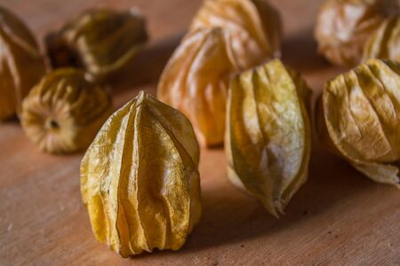 Physalis fruit on the wooden backgroundの写真素材