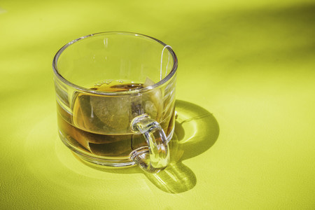 Closeup of teabag on cup