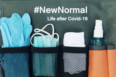 Word of New Normal in new lifestyle concept after Covid-19 / Coronavirus pandemic. Travel bag...