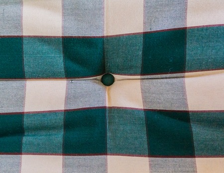 square blocks pattern on a pillow closeup macro texture background