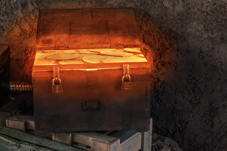 Modern pirate treasure chest filled with golden glowing bitcoins, cryptocurrency concept, modern...