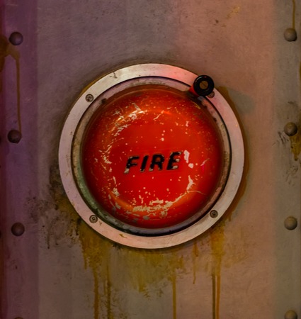 Old vintage fire alarm bell in a submarine, old safety equipment