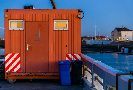 Mobile container office in the harbor near a construction site, transportable working placeの写真素材