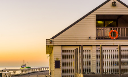 Beach house on the jetty of Blankenberge, Belgium, Architecture of the Belgian coast during sunsetの写真素材