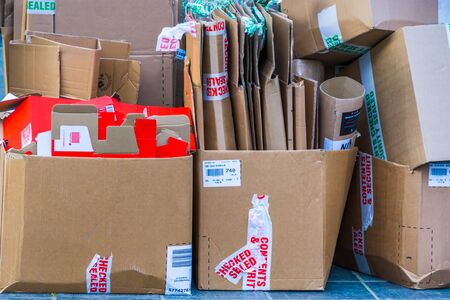 closeup of old carton boxes on the streets of antwerp, Garbage recycling concept, Antwerpen, Belgium, April 23, 2019のeditorial素材