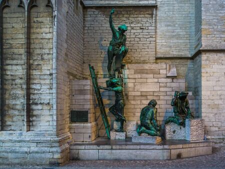 statues of construction workers at the vrouwekathedraal of antwerp city, antwerpen, Belgium, April 23, 2019のeditorial素材