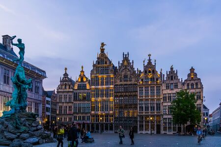 monument sculpture with historic buildings at the grotemarkt of antwerp city, Antwerpen, Belgium, April 23, 2019のeditorial素材