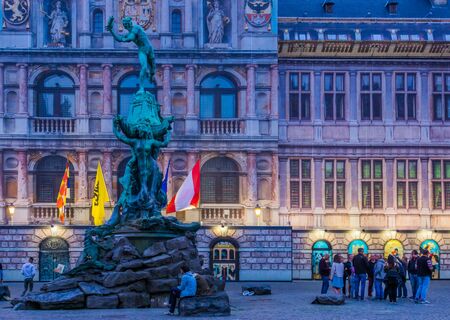 The monument statue at the city hall of antwerp city, popular city architecture, grotemarkt, Antwerpen, Belgium, April 23, 2019のeditorial素材