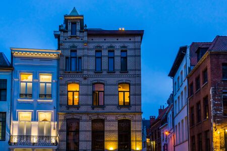 lighted city architecture by night in the center of antwerp city, Toba and neuhaus, Antwerpen, Belgium, April 23, 2019のeditorial素材