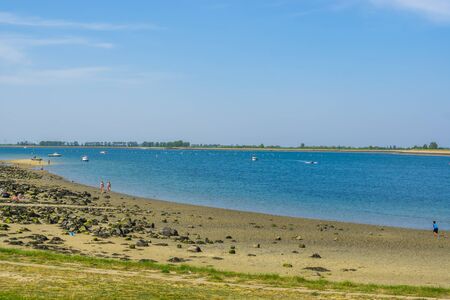 The coastline of bergse diepsluis, popular beach in tholen, Zeeland, oesterdam, the Netherlands, 22 april, 2019のeditorial素材