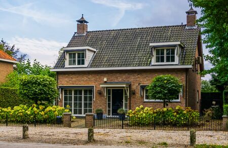 typical dutch villa with garden, city architecture of Breda, The Netherlandsの写真素材