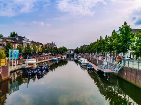 Canal with boats and architecture in the city of Breda, The Netherlands, 17 july, 2019