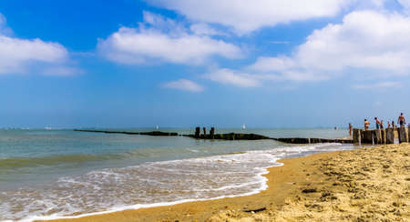 beautiful ocean view with wave breakers on the beach of Breskens, Zeeland, The Netherlandsの写真素材