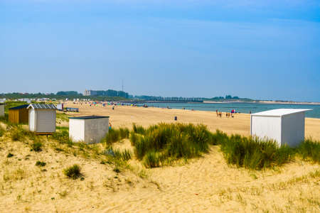 The sand dunes of Breskens with cottages and view on the touristic beach, Zeeland, The Netherlandsの写真素材